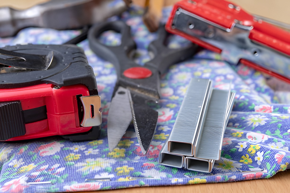 upholstery tools on floral fabric